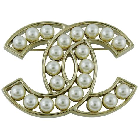 chanel gold tone brooch|Chanel pearl brooch price.